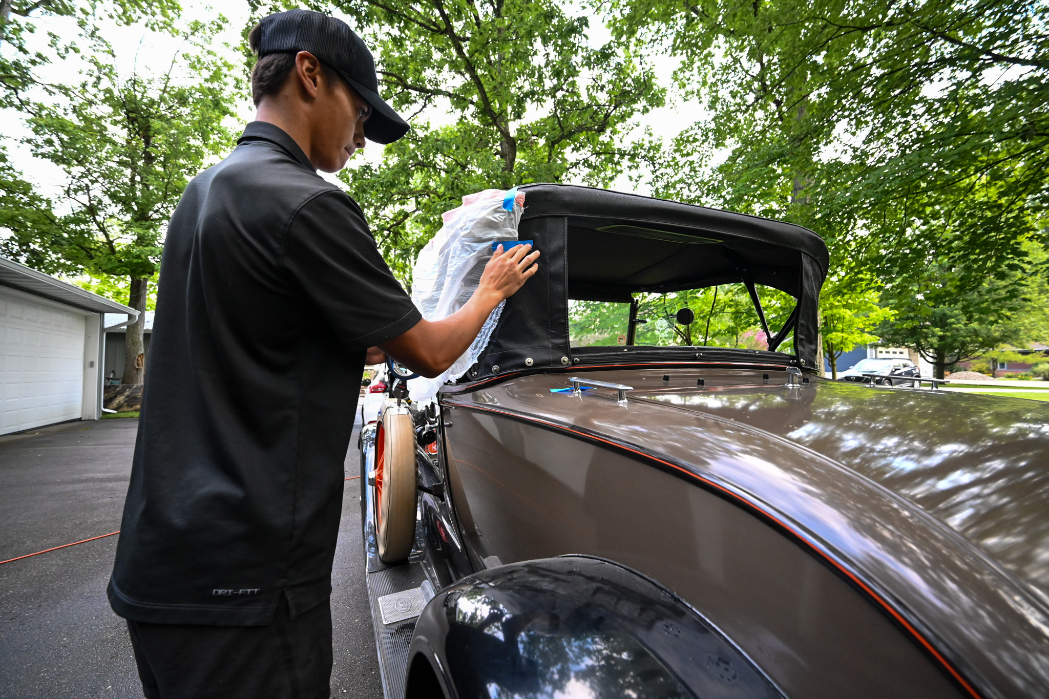 Hand-detailing the classic car body
