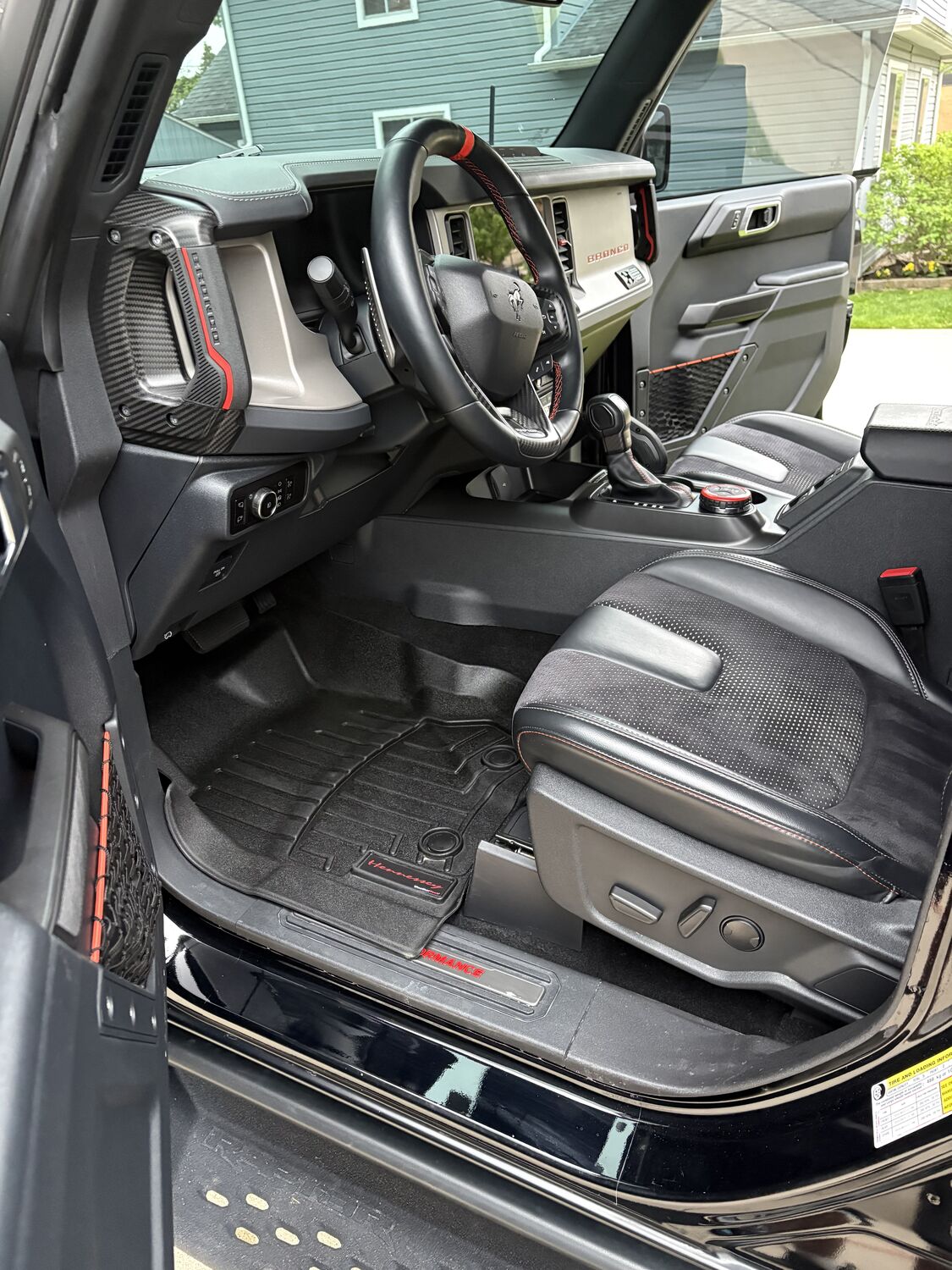 Spotless SUV interior with red leather seats