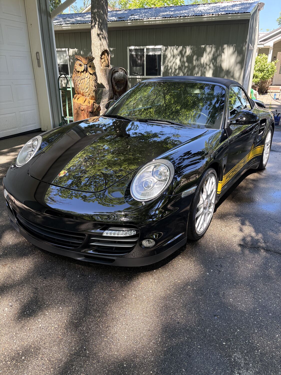 Freshly detailed Porsche 911 in the driveway
