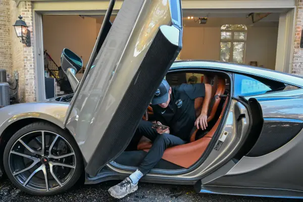 Nick working inside the McLaren with the door up