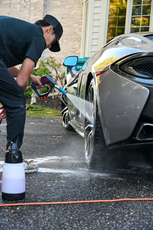 Spraying the McLaren wheels