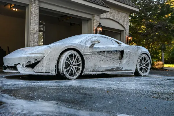 McLaren under a full foam cover