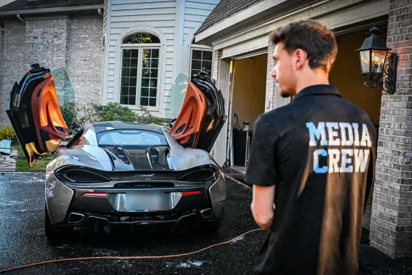 Camera crew filming the McLaren detail