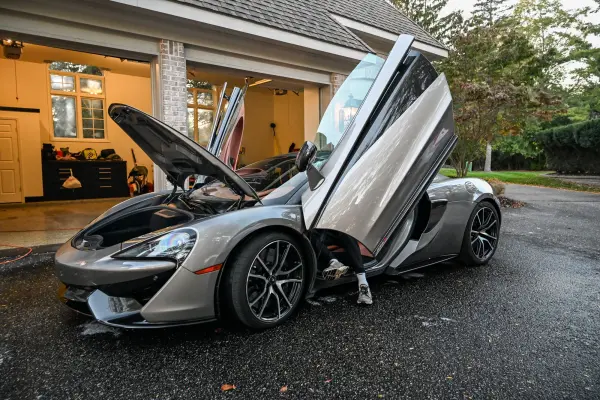 McLaren with hood and doors open