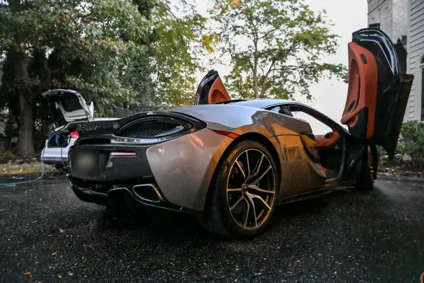 Finished McLaren, rear three-quarter with doors up